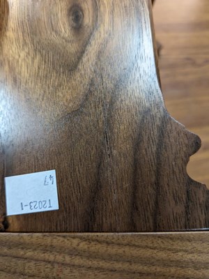Lot 212 - David Linley (born 1961) a pair of walnut columnar book ends