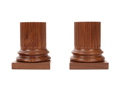 Lot 212 - David Linley (born 1961) a pair of walnut columnar book ends