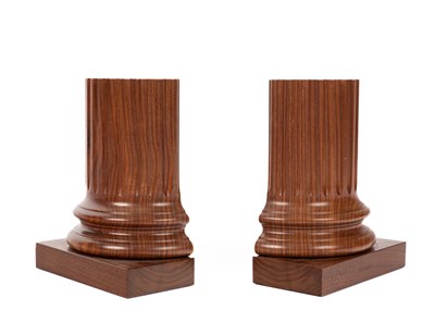 Lot 212 - David Linley (born 1961) a pair of walnut columnar book ends