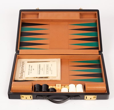 Lot 297 - A travel backgammon set