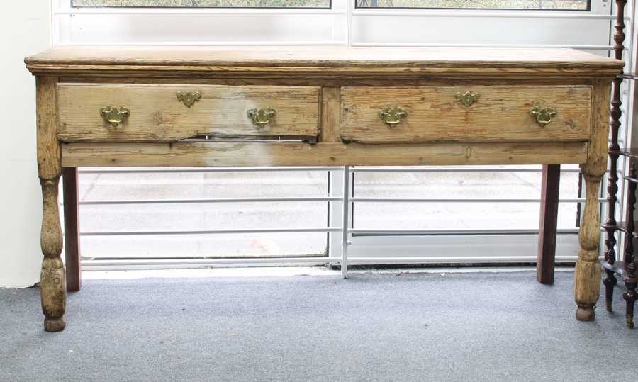Lot 73 - An 18th Century pine two-drawer dresser base...