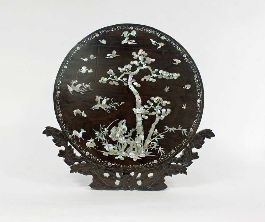 Lot 212 - A Chinese hardwood shell inlaid screen with