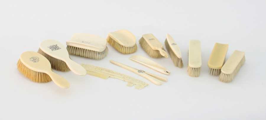Lot 276 - Nine ivory backed brushes and other items