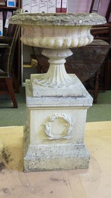 Lot 2 - A large reconstituted stone urn, of campana...