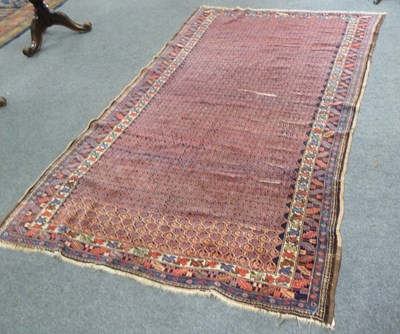 Lot 26 - A Feraghan rug with central geometric field...