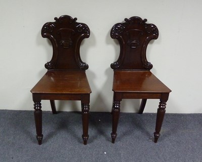 Lot 37 - A pair of Victorian mahogany hall chairs