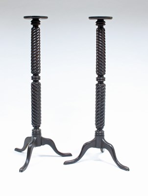 Lot 40 - A pair of reeded column stands