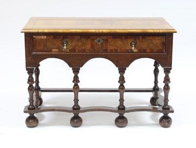 Lot 70 - A William and Mary oak and walnut side table,...