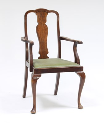 Lot 90 - A Queen Anne style walnut armchair, circa 1930,...