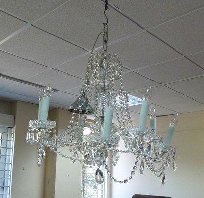 Lot 100 - An eight-light cut glass chandelier, 20th...