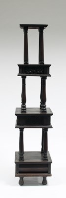 Lot 109 - An oak four-tier whatnot on turned supports,...