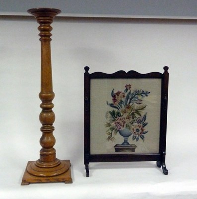 Lot 127 - An oak torch??re of turned column form,...