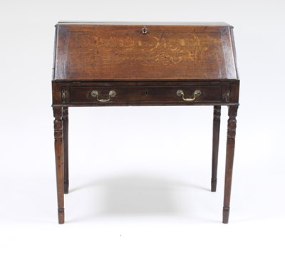 Lot 134 - A 19th Century oak desk, fitted beneath the...