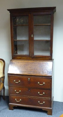 Lot 138 - A late 18th Century bureau with bookcase over,...