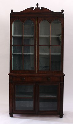 Lot 152 - A Regency mahogany bookcase with shaped...