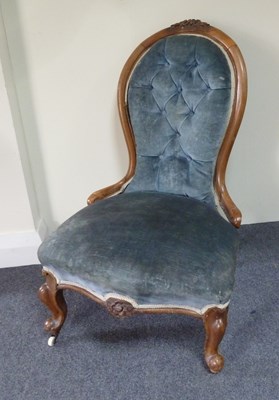 Lot 171 - A Victorian walnut chair, the top carved...