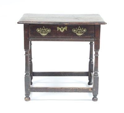 Lot 177 - An 18th Century oak table, the rectangular top...