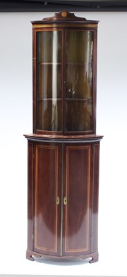 Lot 179 - A mahogany corner cupboard, banded in...