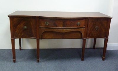 Lot 180 - A mahogany sideboard with serpentine front,...