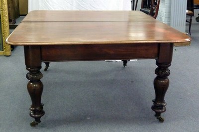 Lot 190 - A Victorian mahogany dining table fitted three...