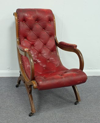 Lot 193 - A Victorian armchair with deep buttoned back...