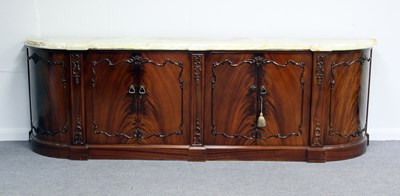 Lot 201 - A mahogany sideboard, the onyx top above two...