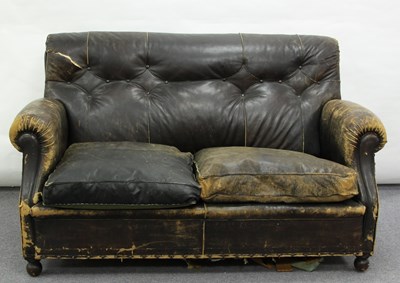 Lot 202 - An early 20th Century leather upholstered sofa...