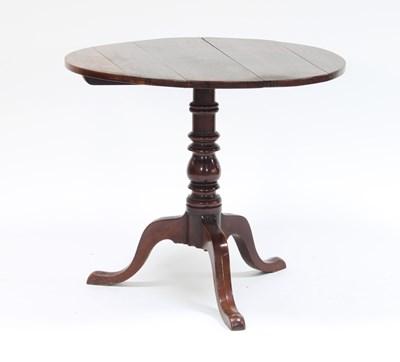 Lot 212 - An 18th Century fruitwood tripod table with...