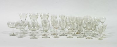 Lot 216 - A set of five vine cut glass wine glasses,...