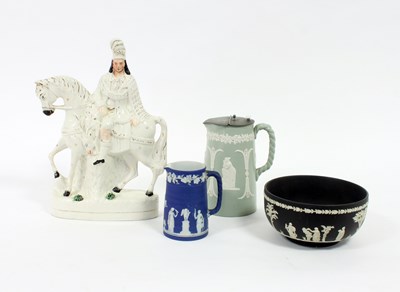 Lot 248 - A Wedgwood jasperware jug decorated Classical...