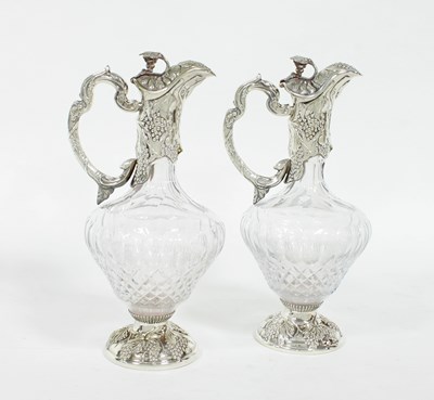 Lot 448 - A pair of EPNS mounted claret jugs, David...