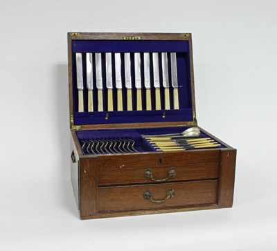 Lot 451 - An oak canteen containing a part set of EPNS...