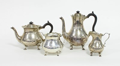 Lot 475 - A silver four-piece tea service, Goldsmiths &...