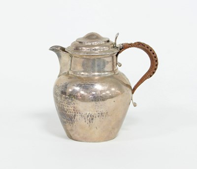 Lot 479 - A silver lidded milk jug circa 1800 (marks...