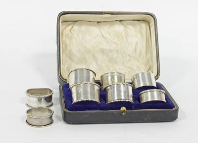 Lot 507 - Three silver napkin rings, CB & S, Sheffield...