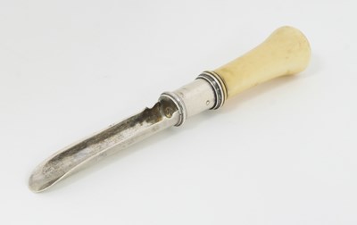 Lot 514 - An ivory handled silver apple corer with...