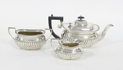 Lot 517 - A three-piece silver tea set, CH, Birmingham...