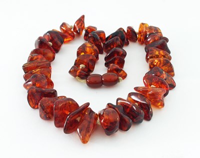 Lot 553 - An Baltic amber necklace, formed of 41...