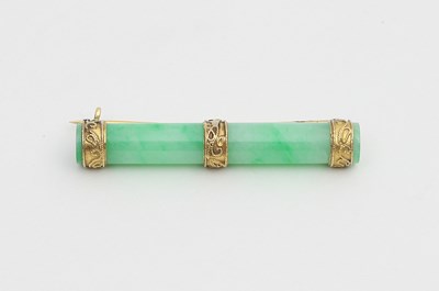 Lot 554 - A Victorian gold and jade brooch, the jade of...