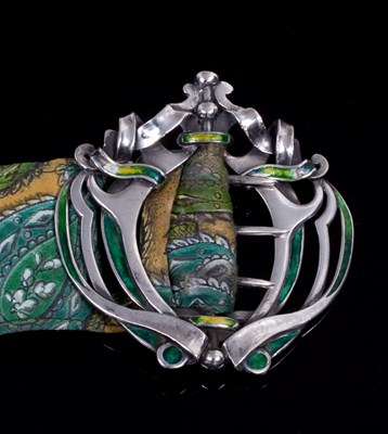 Lot 557 - An Art Nouveau silver and enamel belt buckle,...