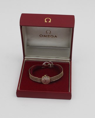 Lot 563 - A lady's 9ct gold wristwatch by Omega, the...