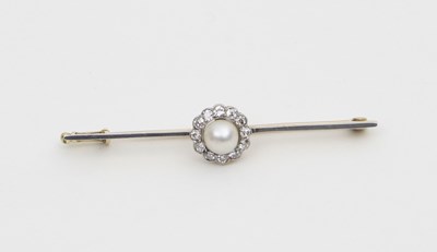 Lot 568 - An Edwardian pearl and diamond bar brooch, the...