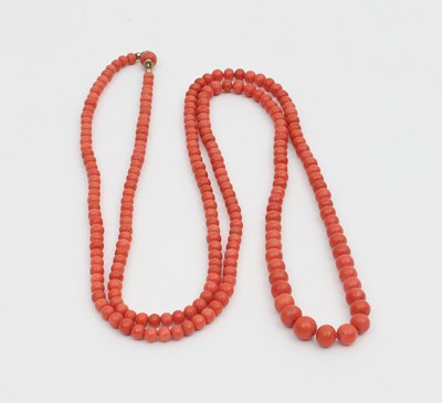 Lot 576 - A long coral bead necklace, graduated from the...