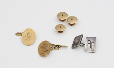 Lot 588 - A pair of 18ct gold oval shaped cufflinks each...