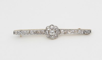 Lot 592 - An Edwardian gold and diamond bar brooch,...