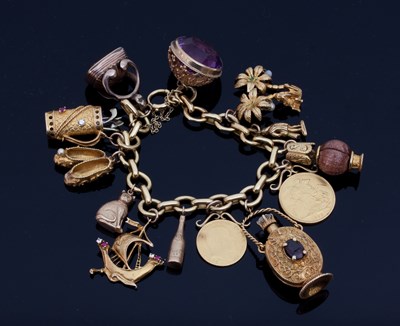 Lot 607 - An 18ct gold curb link charm bracelet,...