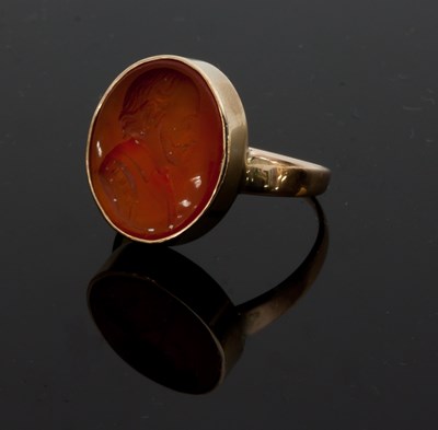 Lot 608 - A gold cornelian intaglio ring, late 19th...