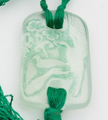 Lot 611 - A Lalique 'Colombes' glass pendant, the...