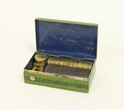 Lot 629 - A 19th Century Swiss music box, the movement...