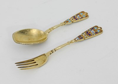 Lot 645 - A Russian silver gilt and enamel spoon and...